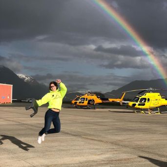 a rainbow in a parking lot