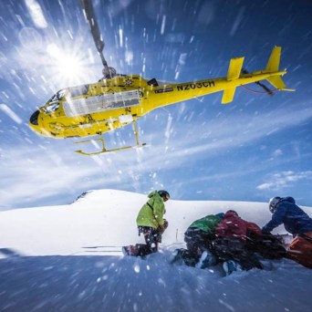 a person flying through the air on a snow board
