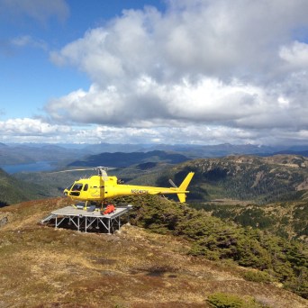 a plane sitting on the side of a mountain