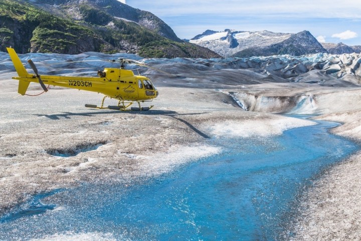 a plane sitting on top of a mountain