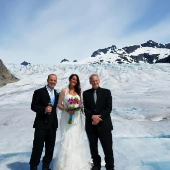 a person standing on a snow covered mountain