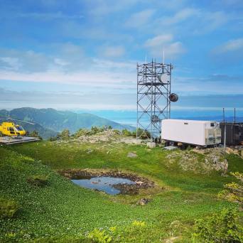 a airplane that is on a grassy hill